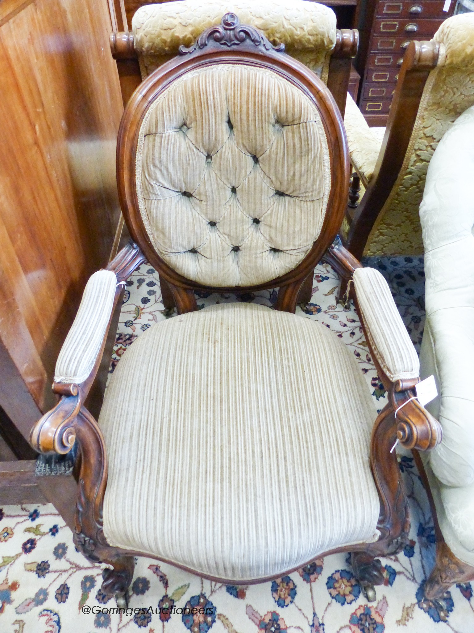 A Victorian oval back chair, on cabriole legs